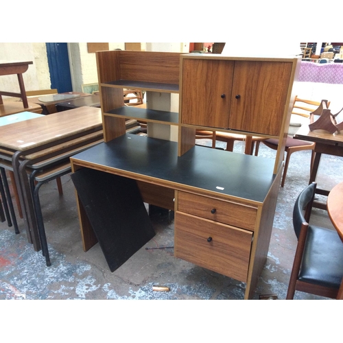 662 - A TEAK EFFECT WORKSTATION DESK WITH TWO DOORS AND TWO DRAWERS