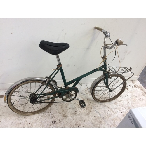 12 - TWO VINTAGE LADIES SHOPPING BIKES, ONE WHITE RALEIGH FOLDING BIKE WITH 3 SPEED GEAR SYSTEM AND ONE G... 