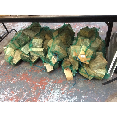 121 - TEN BAGS OF FIRE LOGS