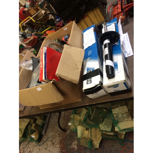 128 - FIVE ITEMS TO INCLUDE BOXED NEW BOGE BMW FRONT SHOCK ABSORBERS AND TWO BOXES CONTAINING GENUINE FORD... 