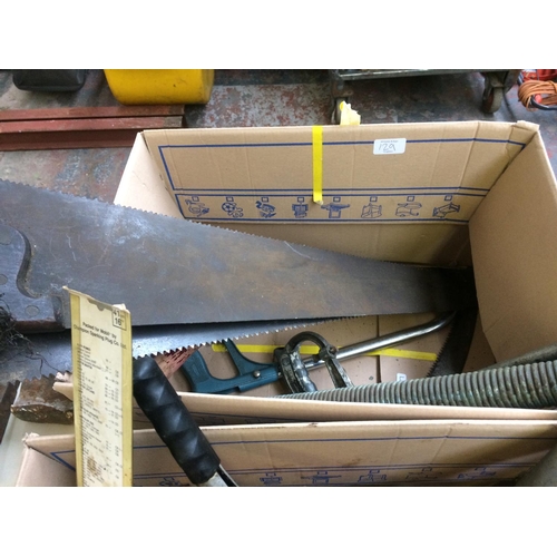 129 - TWO BOXES CONTAINING VINTAGE HANDSAWS, GREASE GUN, VINTAGE CAR TRAFFICATORS, HACK SAWS ETC