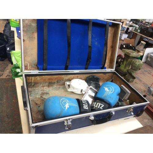 131 - A BLUE EVEREST FLIGHT CASE CONTAINING TELEPHONE EXTENSION LEAD, KICK BOXING GLOVES ETC