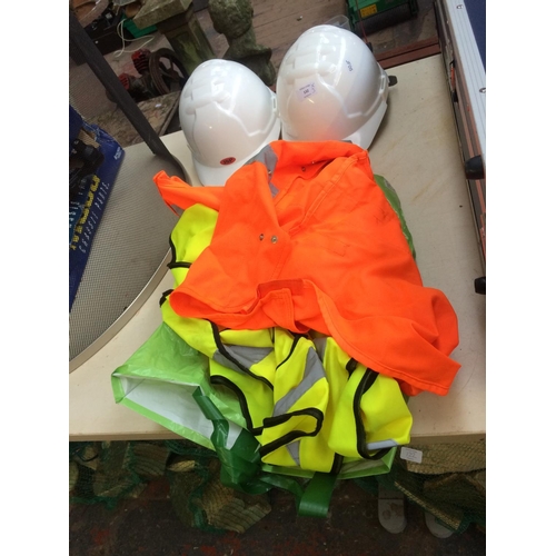 132 - THREE ITEMS TO INCLUDE TWO WHITE SAFETY HARD HATS AND A BAG CONTAINING HI VIS VESTS