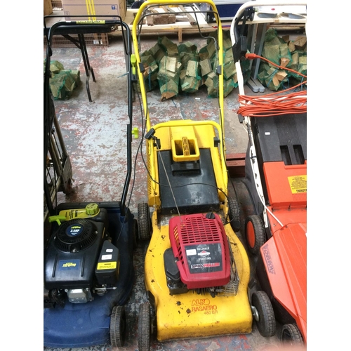 158 - A RED AND YELLOW ALKO PETROL LAWN MOWER (Model RASAERO 480BR) WITH GRASS COLLECTOR AND BRIGGS & STRA... 