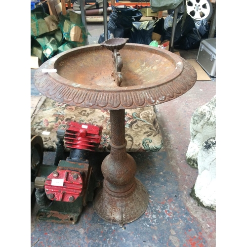 164 - A CAST IRON ORNATE PEDESTAL BIRD BATH