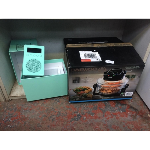 185 - TWO BOXED ITEMS TO INCLUDE A DAEWOO HALOGEN COOKER AND A JOHN LEWIS SPECTRUM SOLO DAB RADIO