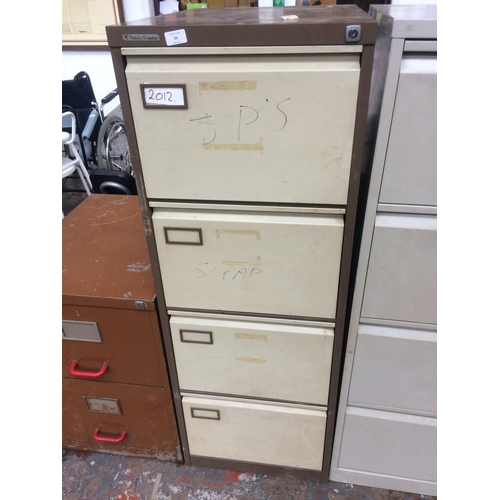 23 - A VICKERS TRIMLINE BROWN AND CREAM METAL FOUR DRAWER OFFICE FILING CABINET