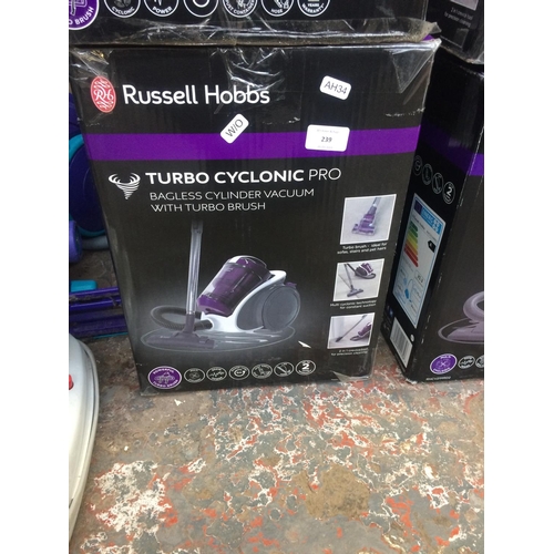 239 - A BOXED RUSSELL HOBBS TURBO CYCLONIC PLUS BAGLESS CYLINDER VACUUM CLEANER (W/O)