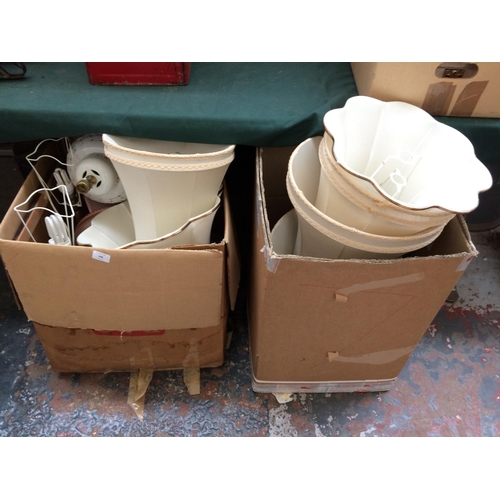 308 - TWO BOXES CONTAINING MIXED TABLE LAMPS AND SHADES