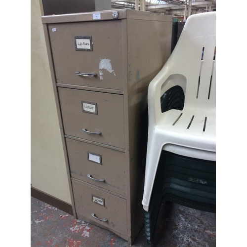 32 - A GREY METAL FOUR DRAWER OFFICE FILING CABINET