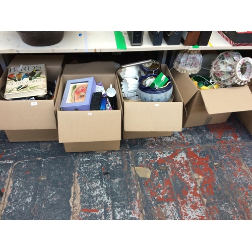 326 - FOUR BOXES CONTAINING CHINA, BOOKS, RADIOS, KITCHENWARE, LAMPS ETC