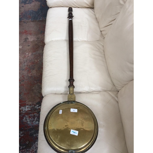 353 - A BRASS BED WARMING PAN