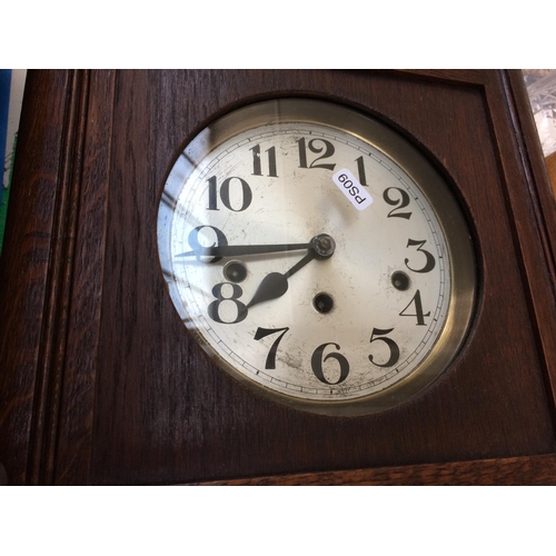 371 - A VINTAGE OAK WESTMINSTER CHIME WALL CLOCK WITH PENDULUM