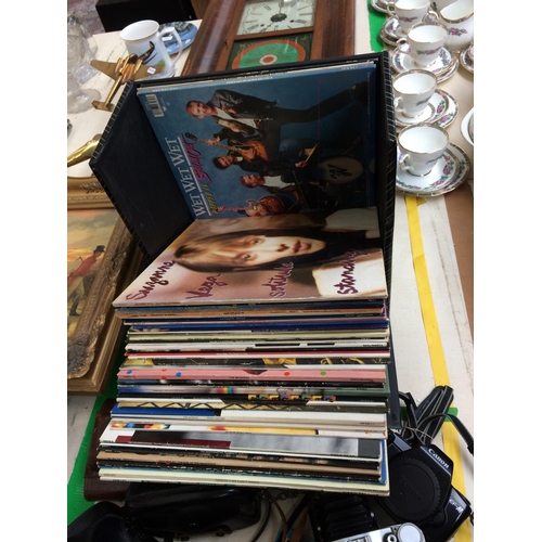 450 - A COLLECTION OF MIXED LP RECORDS TO INCLUDE SUZANNE VEGA, TALKING HEADS, STING ETC