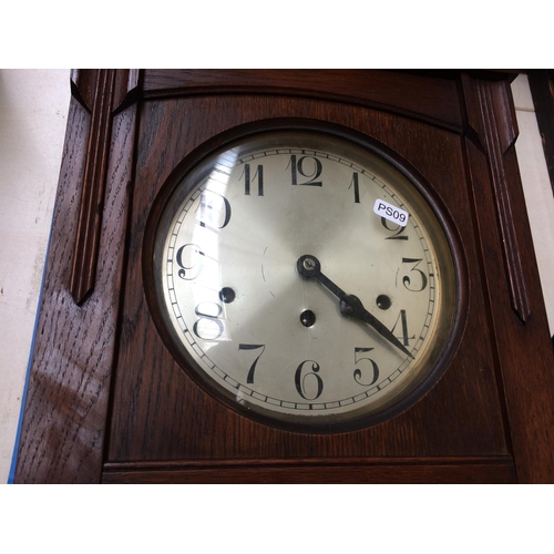 475 - A LARGE OAK WESTMINSTER CHIME WALL CLOCK WITH PENDULUM AND KEY