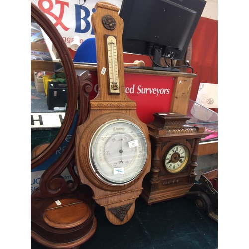 502 - A VINTAGE OAK BAROMETER