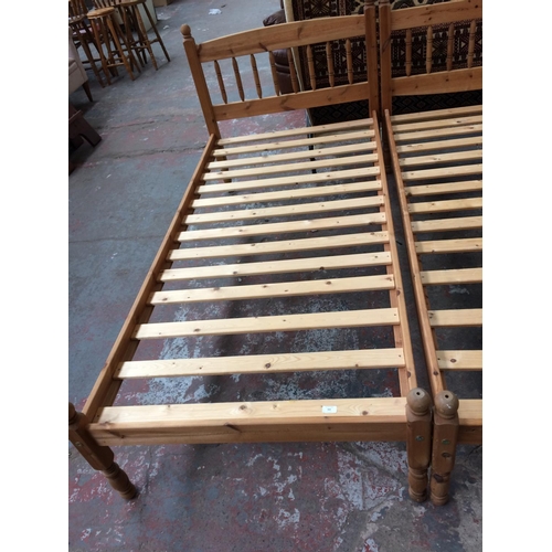 562 - A PINE SINGLE BED FRAME