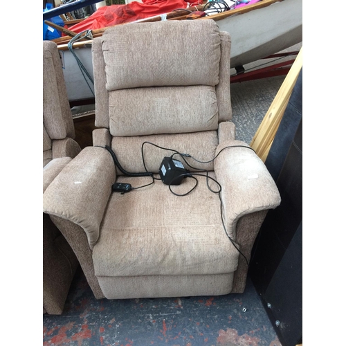 571 - A BEIGE UPHOLSTERED ELECTRIC RECLINING ARMCHAIR