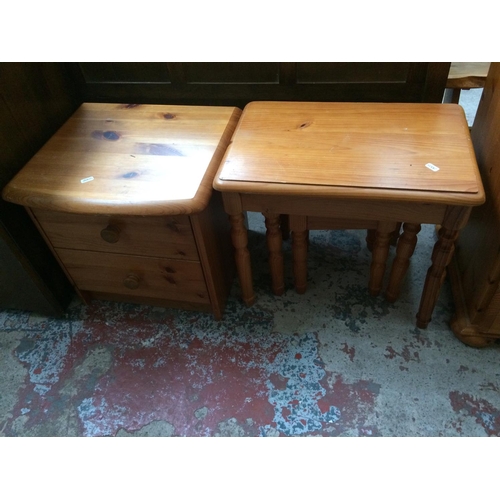 583 - THREE ITEMS: A PINE DRESSING TABLE WITH EIGHT DRAWERS, PINE NEST OF THREE TABLES AND A SMALL PINE CH... 