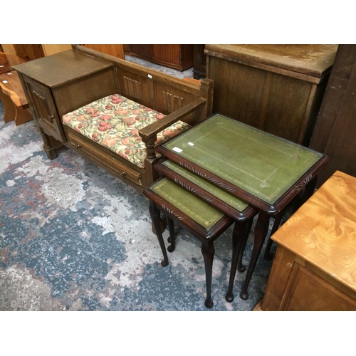 590 - TWO ITEMS: A QUEEN ANNE STYLE MAHOGANY GREEN LEATHER TOP NEST OF THREE TABLES AND A VINTAGE OAK TELE... 