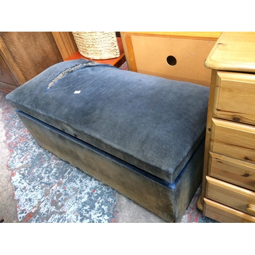 596 - A BLUE VELVET BEDDING CHEST