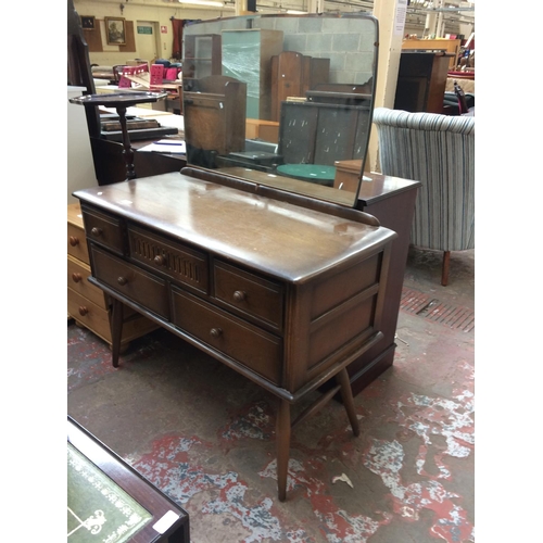 624 - A VINTAGE ERCOL STYLE DRESSING TABLE WITH FIVE DRAWERS AND UPPER MIRROR