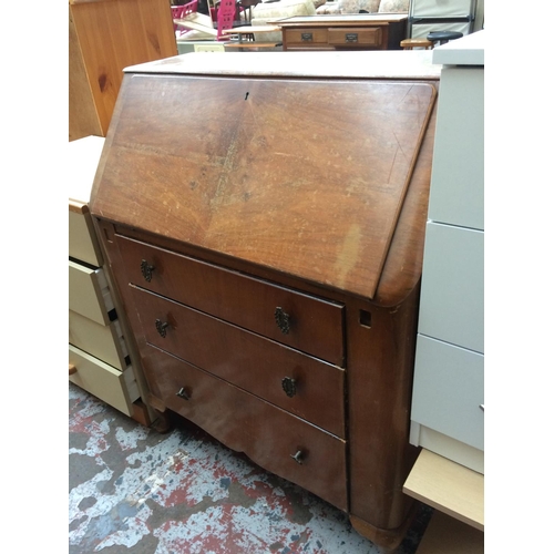 626 - A MAHOGANY BUREAU WITH THREE DRAWERS AND FALL FRONT