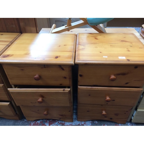 628 - TWO PINE BEDSIDE CHESTS OF THREE DRAWERS (MATCHING LOTS 552, 553, 629 & 630)