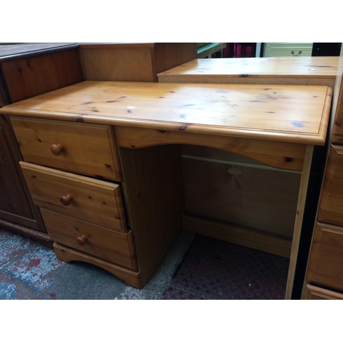 631 - A PINE DRESSING TABLE WITH THREE DRAWERS AND A DRESSING TABLE MIRROR