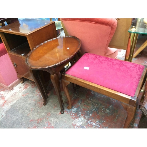 638 - THREE ITEMS: A MAHOGANY PIANO STOOL, BURR WALNUT NEST OF THREE TABLES AND A MAHOGANY BEDSIDE CABINET