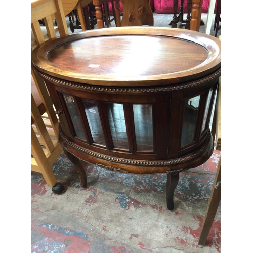 657 - A VINTAGE ROSEWOOD DRINKS CABINET WITH DETACHABLE TRAY