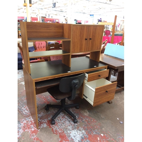 662 - A TEAK EFFECT WORKSTATION DESK WITH TWO DOORS AND TWO DRAWERS