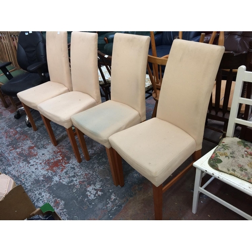 717 - FOUR CREAM UPHOLSTERED DINING CHAIRS