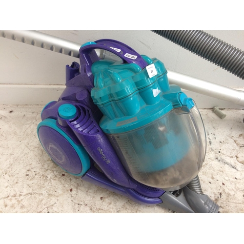 240 - A PURPLE AND BLUE DYSON CYLINDER BAGLESS VACUUM CLEANER (W/O)