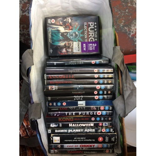 331 - TWO BAGS OF DVDS AND TWO BAGS OF CAMERAS TO INCLUDE PLANET OF THE APES, HALLOWEEN, NIGHTMARE ON ELM ... 