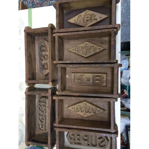 460 - TEN VINTAGE STYLE WOODEN BRICK MOULDS