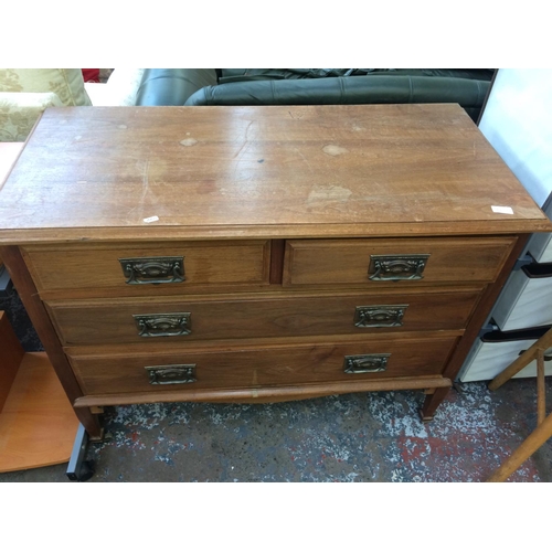 669 - TWO ITEMS: AN EDWARDIAN OAK CHEST OF TWO SHORT OVER TWO LONG DRAWERS AND A TEDDY BEAR PICTURE