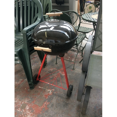 37 - A RED AND BLACK METAL BBQ