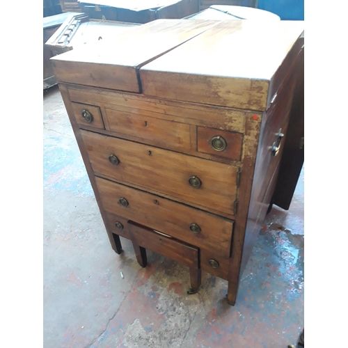 1126 - A REGENCY MAHOGANY CAMPAIGN CHEST WITH LOWER COMMODE, TWO DRAWERS AND CONCEALED TOILET MIRROR