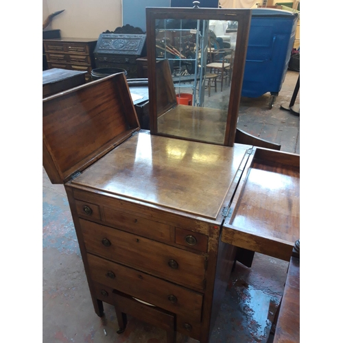 1126 - A REGENCY MAHOGANY CAMPAIGN CHEST WITH LOWER COMMODE, TWO DRAWERS AND CONCEALED TOILET MIRROR