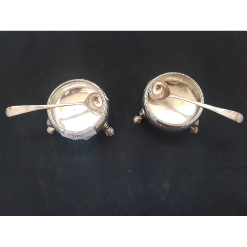 1090 - A PAIR OF HALLMARKED SILVER OF BIRMINGHAM 1843 TABLE SALTS, BOTH WITH SPOONS