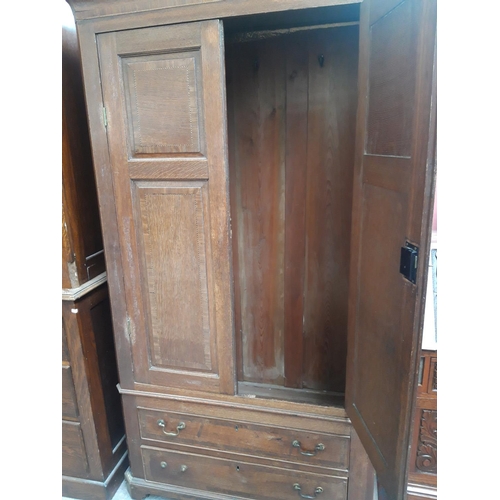 1116 - AN EARLY 20th CENTURY INLAID OAK WARDROBE WITH TWO LONG DRAWERS