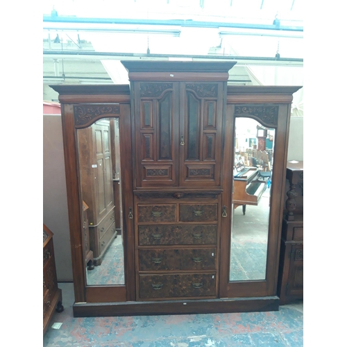 1118 - A LARGE EDWARDIAN MAHOGANY AND BURR WALNUT TRIPLE WARDROBE WITH TWO MIRRORED GLASS DOORS, TWO UPPER ... 