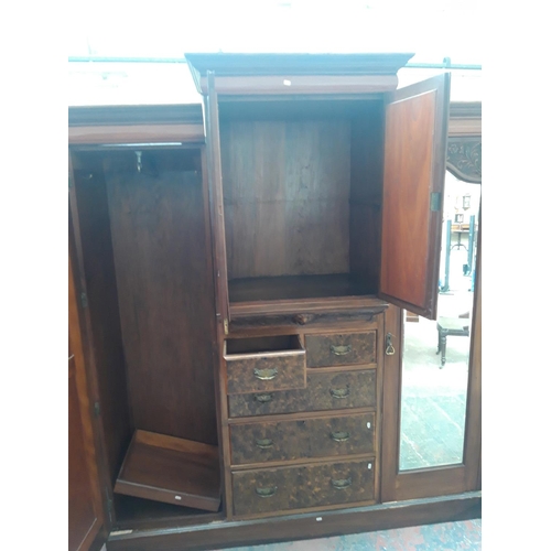 1118 - A LARGE EDWARDIAN MAHOGANY AND BURR WALNUT TRIPLE WARDROBE WITH TWO MIRRORED GLASS DOORS, TWO UPPER ... 