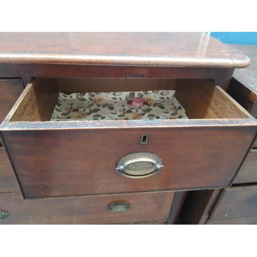 1121 - A VICTORIAN MAHOGANY CHEST OF TWO SHORT AND THREE LONG DRAWERS WITH BRASS REGENCY STYLE HANDLES