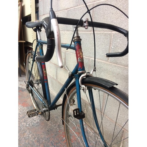 1107 - A VINTAGE BLUE 1960'S W.F. HOLDSWORTH MERCURY MEN'S RACING BIKE WITH 5 SPEED CAMPAGNOLO GEAR SYSTEM