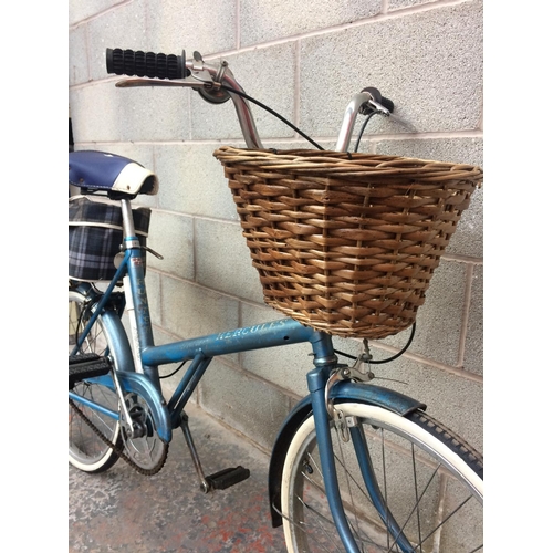 1108 - A BLUE VINTAGE HERCULES HUNTER LADIES SHOPPING BIKE WITH FRONT WICKER BASKET, BROOK SADDLE AND REAR ... 