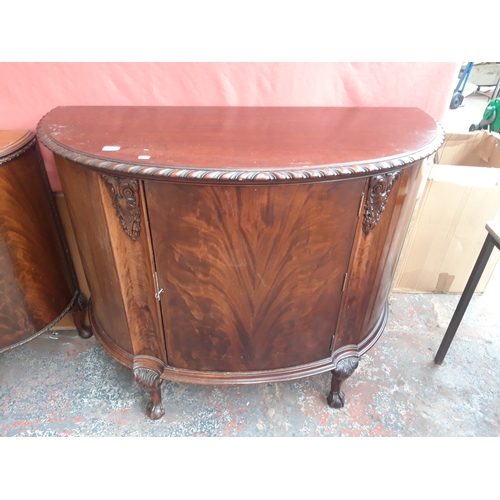 1154 - A FLAMED MAHOGANY SIDEBOARD WITH PIE CRUST EDGE TOP AND ONE CENTRE DOOR ON BALL AND CLAW FEET