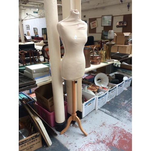 305 - A SHOP MANNEQUIN ON WOODEN TRIPOD STAND