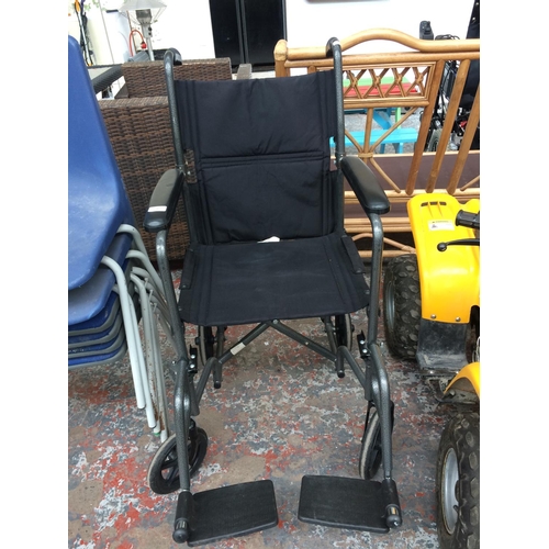 21 - A GREY AND BLACK DRIVE FOLDING WHEELCHAIR